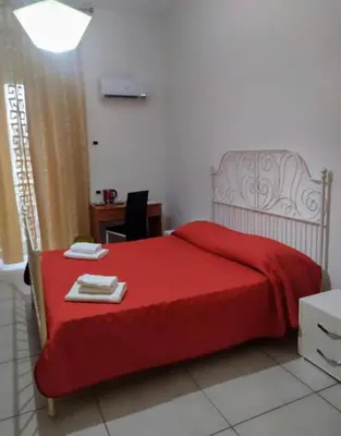 Letto o letti in una camera di B&B Romy