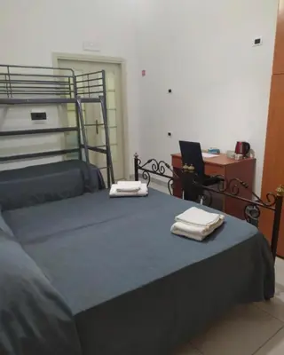 Letto o letti in una camera di B&B Romy