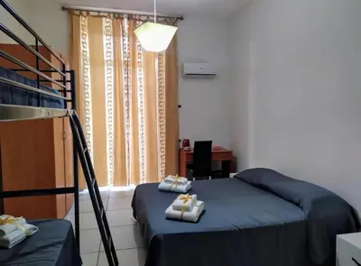 Letto o letti in una camera di B&B Romy