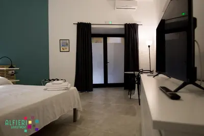 TV o dispositivi per l'intrattenimento presso Alfieri Apartment