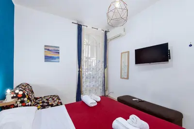 Letto o letti in una camera di Palazzo Pistorius Case Vacanza Centro