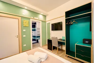 Letto o letti in una camera di La Marina