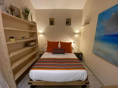 Letto o letti in una camera di Barrio Flat