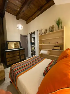 Letto o letti in una camera di Barrio Flat