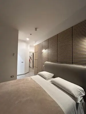 Letto o letti in una camera di International Naples