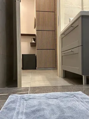 Letto o letti in una camera di International Naples