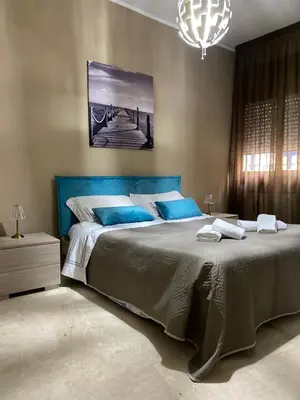 Letto o letti in una camera di Mario's House