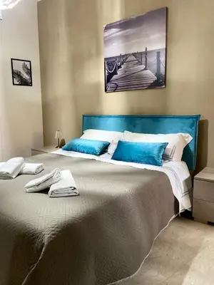 Letto o letti in una camera di Mario's House