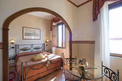 Letto o letti in una camera di Pinto-Storey Hotel
