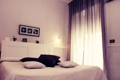 Letto o letti in una camera di Hotel Luna Rossa