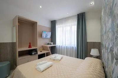 Letto o letti in una camera di P.C. Boutique H. Vesuvius, Napoli Centro, by ClaPa Group