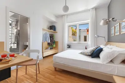 Letto o letti in una camera di Vivaldo Suite Piazza dei Martiri - Guest House
