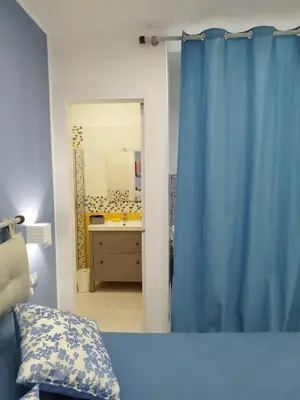 Letto o letti in una camera di B&B Molo Partenope