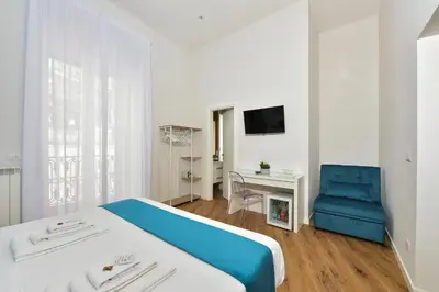 Letto o letti in una camera di ramo d'oro