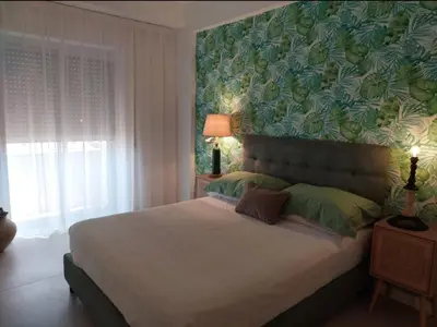 Letto o letti in una camera di Donna Lucia b&b