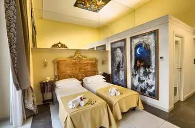 Letto o letti in una camera di Hotel Art Resort Galleria Umberto