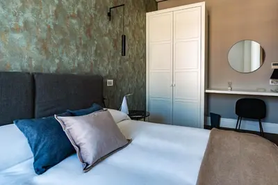 Letto o letti in una camera di AD MAIORA Boutique Suite