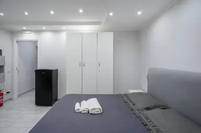 Letto o letti in una camera di Smart’s House Deluxe Quartieri Spagnoli