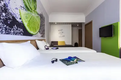 Letto o letti in una camera di Ibis Styles Napoli Garibaldi