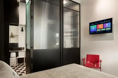 TV o dispositivi per l'intrattenimento presso CocoMorghen Apartment