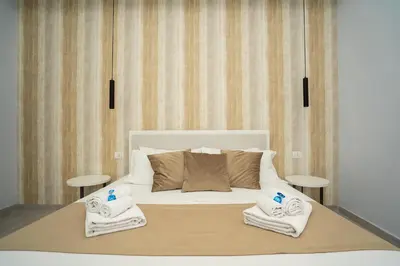 Letto o letti in una camera di Mida's Boutique Rooms