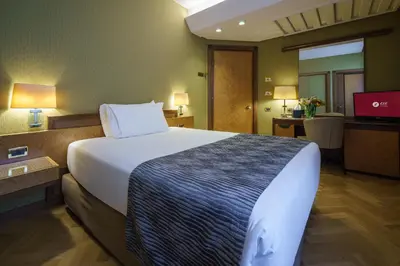 Letto o letti in una camera di Exe Majestic