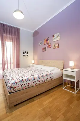 Letto o letti in una camera di Vomero Maison