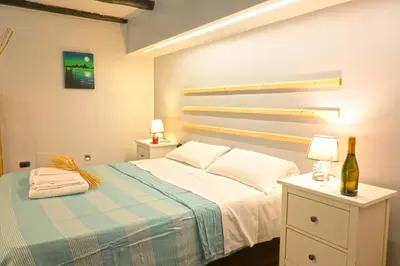Letto o letti in una camera di Casa Mya
