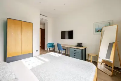 Letto o letti in una camera di CRISPI 74.1 - Apartment