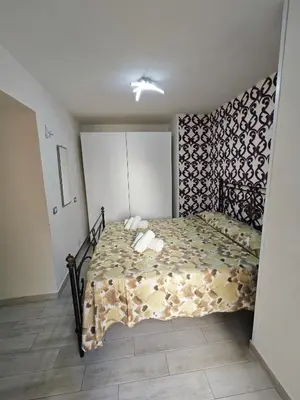 Letto o letti in una camera di Nunzia's House Napoli