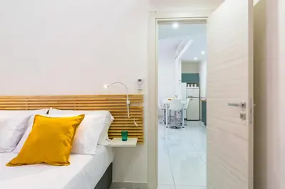 Letto o letti in una camera di Appartamentino ai Quartieri Spagnoli