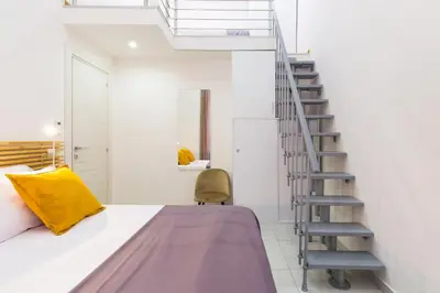 Letto o letti in una camera di Appartamentino ai Quartieri Spagnoli