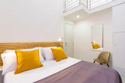 Letto o letti in una camera di Appartamentino ai Quartieri Spagnoli