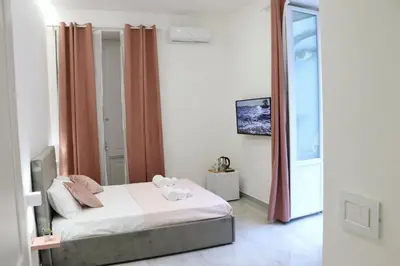 Letto o letti in una camera di Barbaro Suite & Apartment