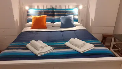 Letto o letti in una camera di New Little House