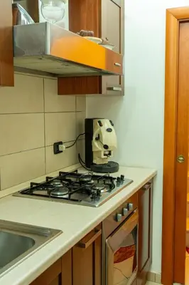 Cucina o angolo cottura di Bellini Holiday Home - Appartamento con balcone NAPOLI