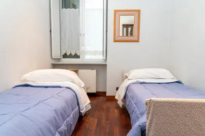 Letto o letti in una camera di Deluxe apartment with garden in Vomero