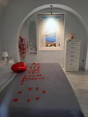 Letto o letti in una camera di Casa Gio’