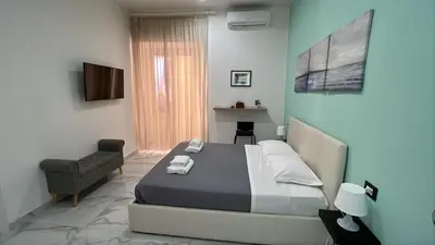 Letto o letti in una camera di InTarsia Rooms