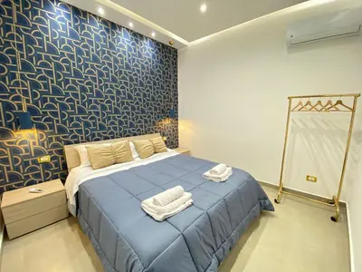 Letto o letti in una camera di Dante Dream Apartment centro storico