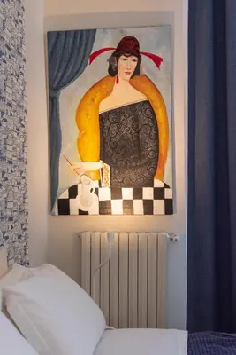 Letto o letti in una camera di B&B Donna Adelina