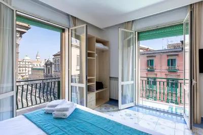 Letto o letti in una camera di Napolit'amo Hotel Medina