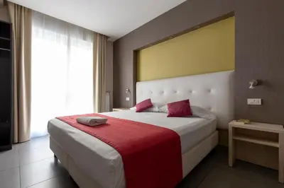 Letto o letti in una camera di Napolit'amo Hotel Medina