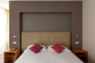Letto o letti in una camera di Napolit'amo Hotel Medina