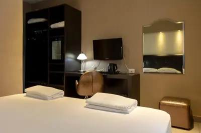 Letto o letti in una camera di Napolit'amo Hotel Medina