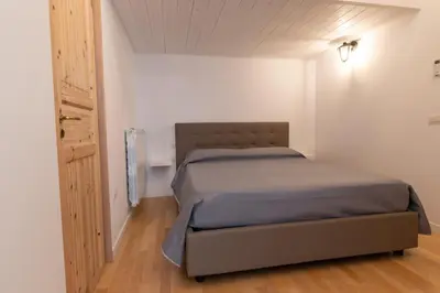 Letto o letti in una camera di Casa Materdei