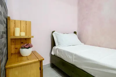 Letto o letti in una camera di Manu Family House