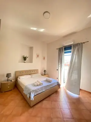 Letto o letti in una camera di La casa di Nettuno