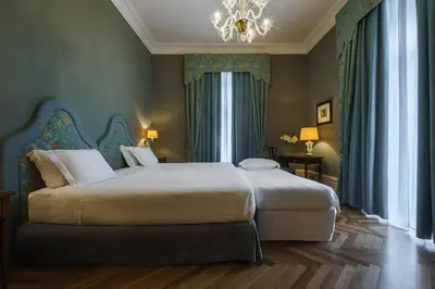 Letto o letti in una camera di Eurostars Hotel Excelsior