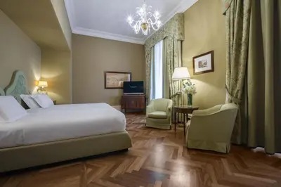 Letto o letti in una camera di Eurostars Hotel Excelsior